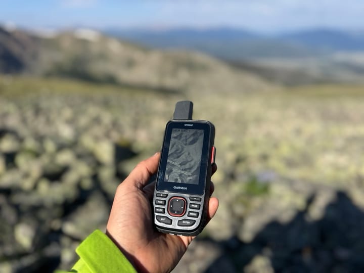 Garmin GPSMAP 67i in a mountain setting